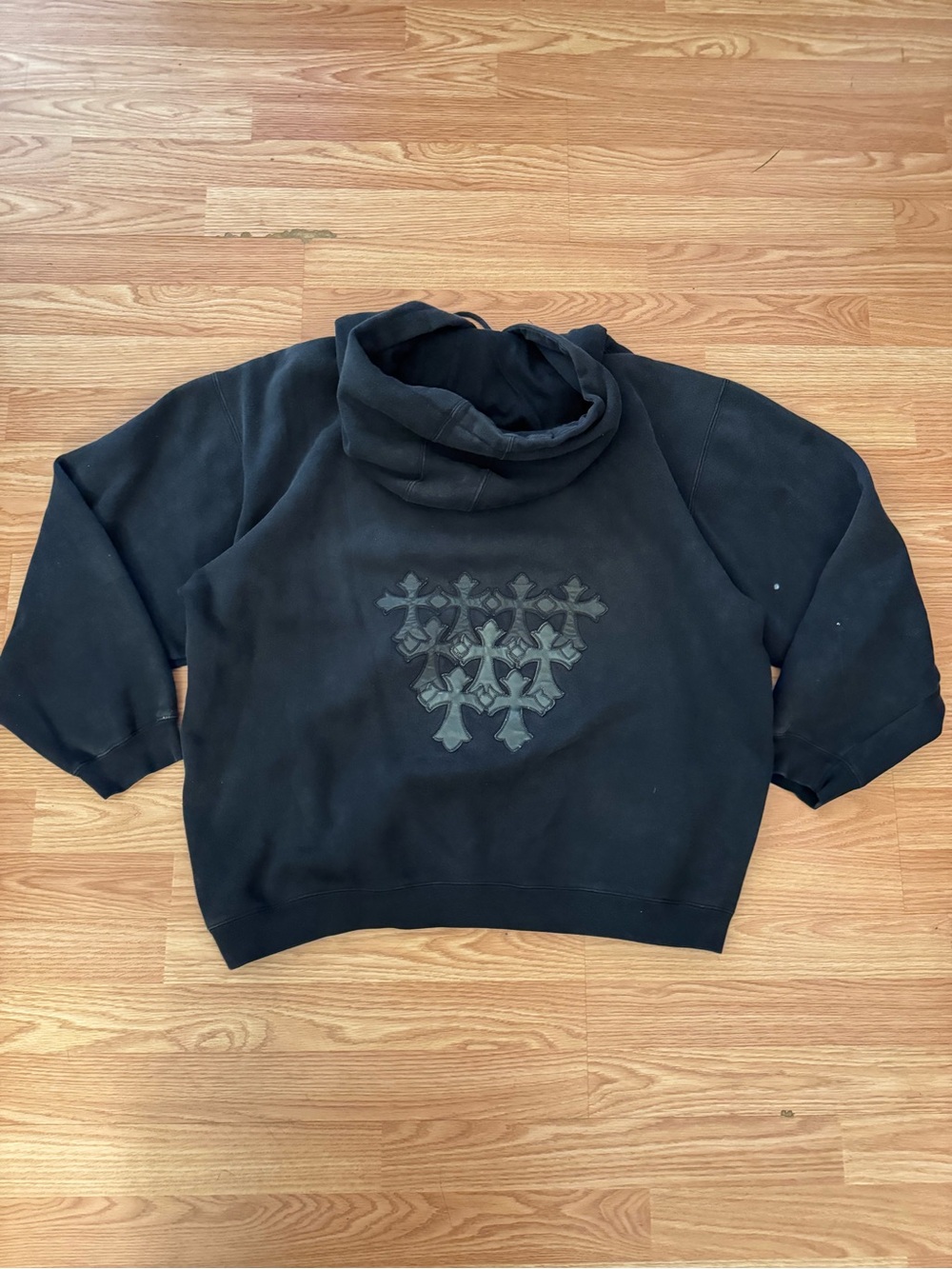 Black hoodie with patchwork crosses
